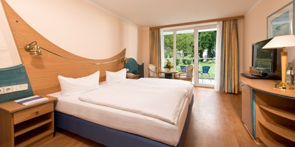 Hochzeit - Werder (Havel) - Beispeilbild Komfortzimmer
Zimmergröße: ca. 25 m²

Im Haus „Päwesin“ befinden sich 21 Komfortzimmer mit Balkon und Blick zur Seeseite. Auf Wunsch können wir in diesen Zimmern ein Extrabett aufstellen. - Hotel Bollmannsruh am Beetzsee