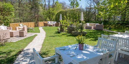 Hochzeit - Art der Location: Gasthaus - Salzburg - Die Gartenanlage des Schlosswirt zu Anif. - ****Hotel Schlosswirt zu Anif