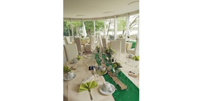 Hochzeit - Geeignet für: Firmenweihnachtsfeier - Brandenburg - Wintergarten Beispeil für Dekoration in grün  - Hotel Bollmannsruh am Beetzsee