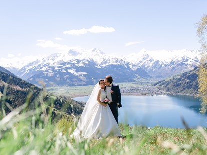 Hochzeit - Umgebung: mit Seeblick - Fotoshooting mit Blick auf den Zeller See und das Kitzsteinhorn - Schloss Prielau Hotel & Restaurants