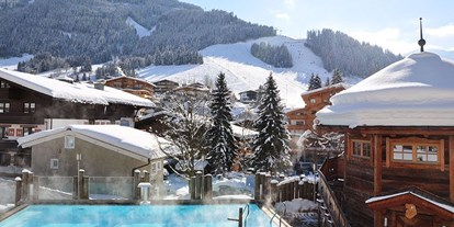 Hochzeit - Preisniveau: hochpreisig - Österreich - Außenpool und Sauna - The Alpine Palace