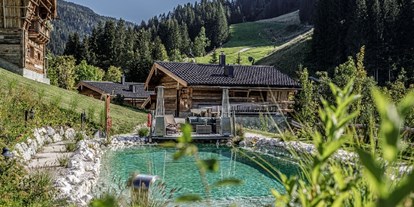 Hochzeit - Winterhochzeit - Obertauern - Unser Naturbadeteich - hier könnt ihr eine freie Trauung haben - Bergdorf Prechtlgut