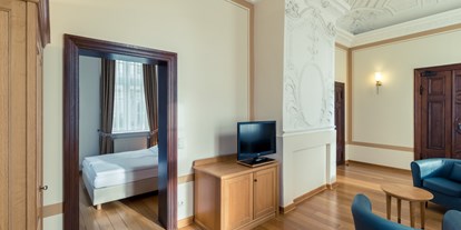 Hochzeit - Art der Location: ausgefallene Location - Rom - Deluxe Suite mit Stuck und Holzparkett - Hotel Schloss Neustadt-Glewe