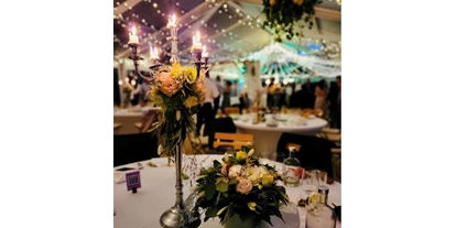 Bruiloft - Bad Harzburg - Tischdeko-Blumen-Kerzen-abends - Eventsaal Bad Harzburg