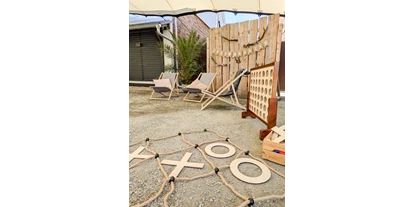 Wedding - Jessen (Elster) - XXL Spiele für Groß und Klein mit Tic Tac Toe und Vier-gewinnt und entspannten Liegestühlen - Unter Freunden | Genuss & Events